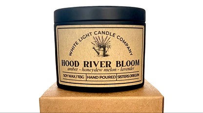 Candle jar with 'White Light Candle Company' label on a white background